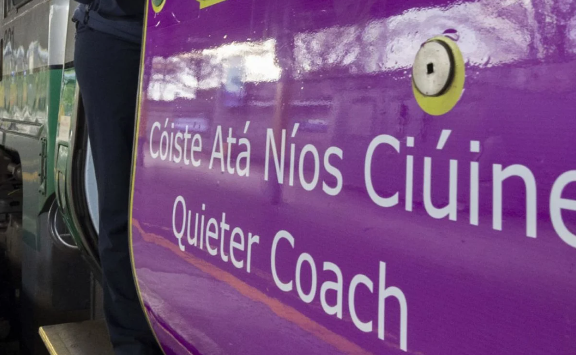 Door of Quiter Coach G on Irish Rail Train with sign that says Quiter Coach